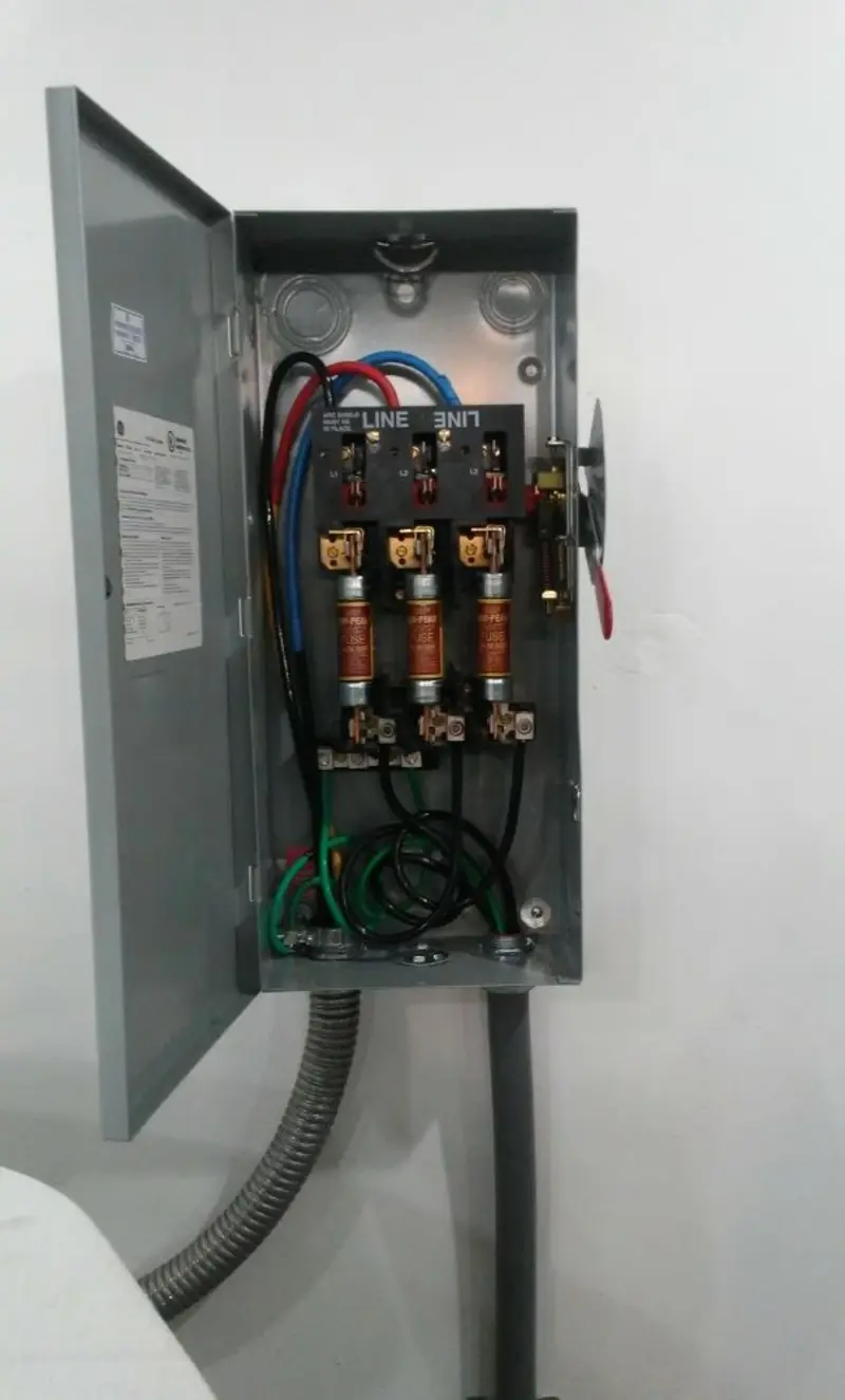 Three-phase disconnect switch installed for Smoke Detector Installation in Greenport